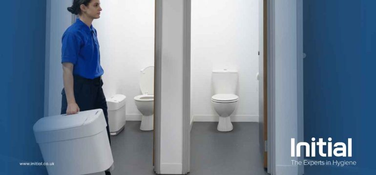 Image showing Initial technician holding a sanitary disposal bin