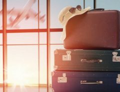 image showing luggage pictured in front of an airport window
